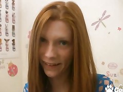 Skinny redhead rubbing her pussy with dick
